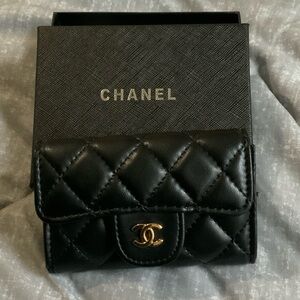 CHANEL Black Quilted Card Holder with Gold Logo